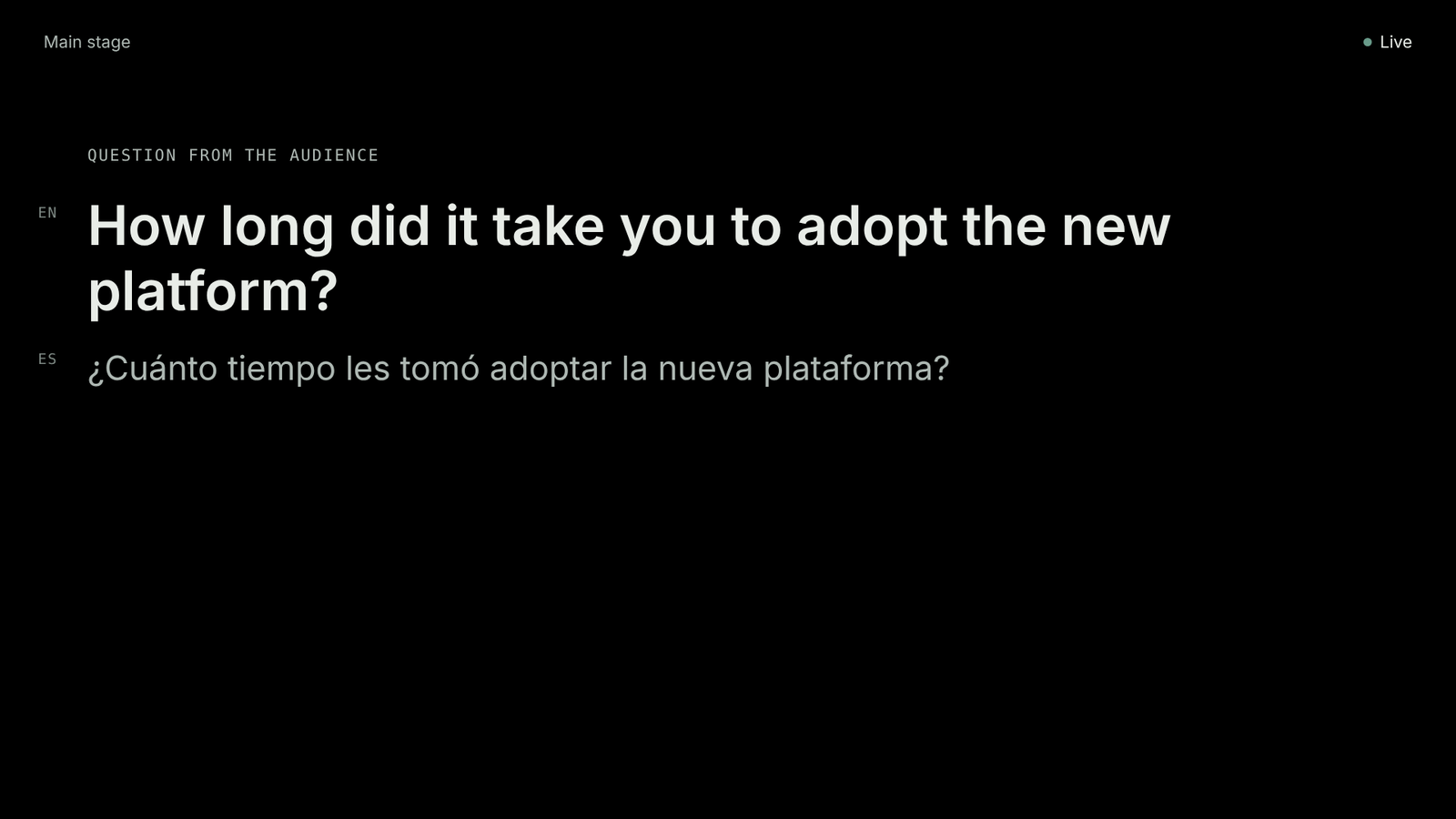 The question on the stage screen, in the speaker’s language first